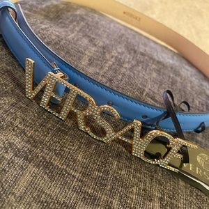 Versace woman’s belt. Baby blue Diamond letters.